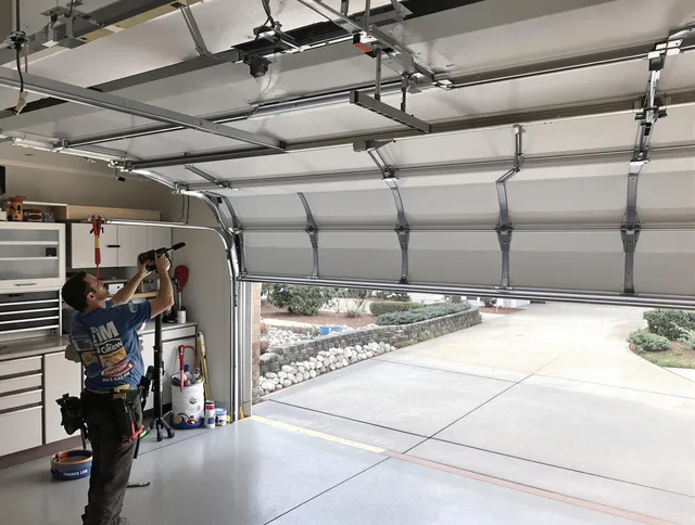 Garage door track repair service by Trumbull Center Garage Door Repair in Trumbull Center